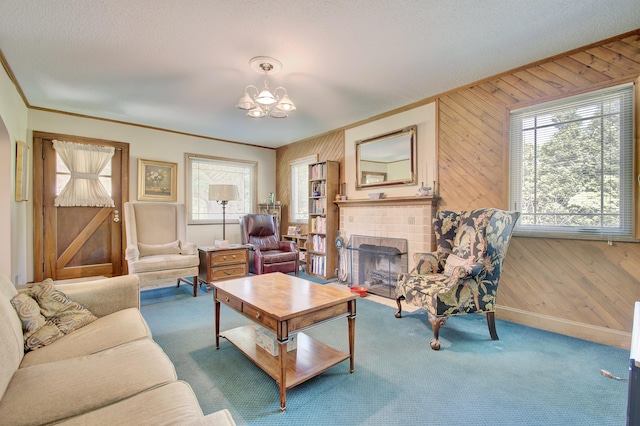 2641 Turkeyfoot Rd, Lakeside Park, KY 41017 - living area featuring carpet, crown molding, a chandelier, wood walls, and baseboards