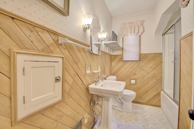 2641 Turkeyfoot Rd, Lakeside Park, KY 41017 - bathroom with wallpapered walls, toilet, wood walls, a sink, and a wainscoted wall