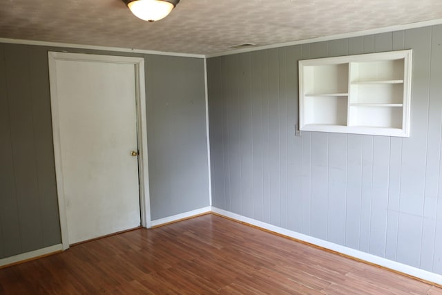 555 Breck Rd, Owenton, KY 40359 - spare room with wood finished floors, baseboards, and wooden walls