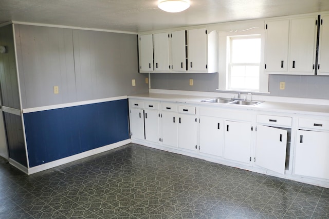555 Breck Rd, Owenton, KY 40359 - kitchen with a sink, dark flooring, light countertops, and white cabinetry