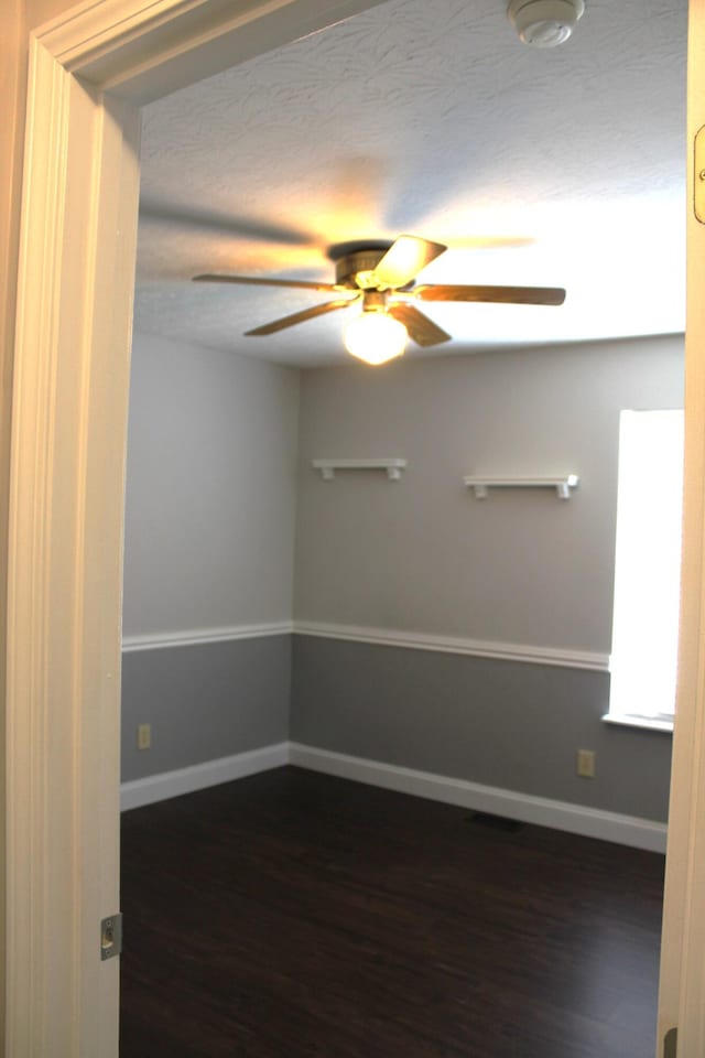 10083 Irish Way, Union, KY 41091 - unfurnished room with ceiling fan, dark wood-style flooring, and baseboards
