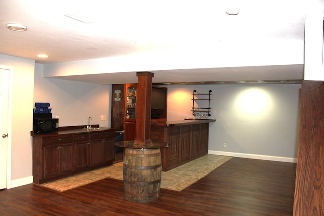 10083 Irish Way, Union, KY 41091 - indoor wet bar with wood finished floors, black microwave, baseboards, and recessed lighting