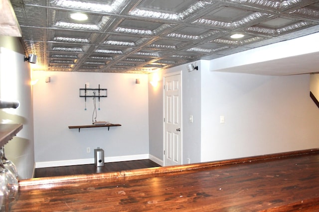 10083 Irish Way, Union, KY 41091 - unfurnished living room featuring baseboards and wood finished floors