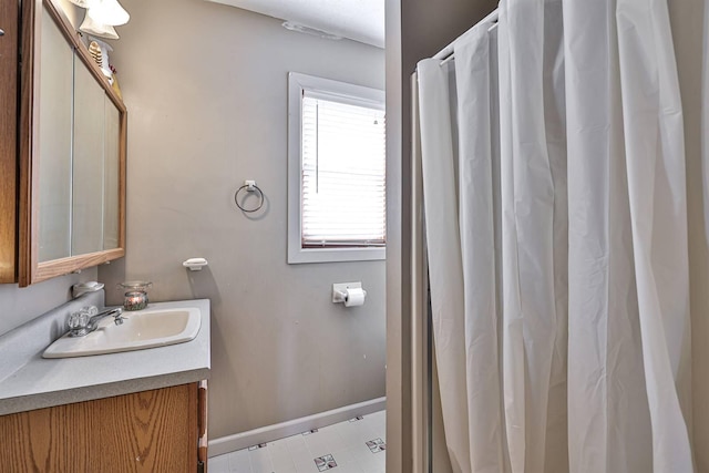 575 Stringtown Rd, Corinth, KY 41010 - bathroom with vanity and baseboards