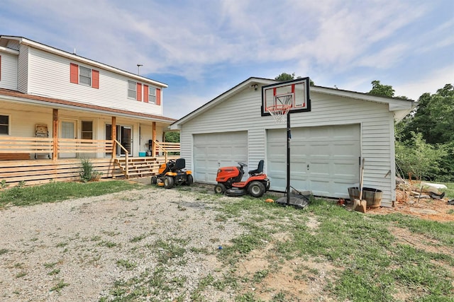 575 Stringtown Rd, Corinth, KY 41010 - view of front of property featuring a garage, an outdoor structure, and covered porch