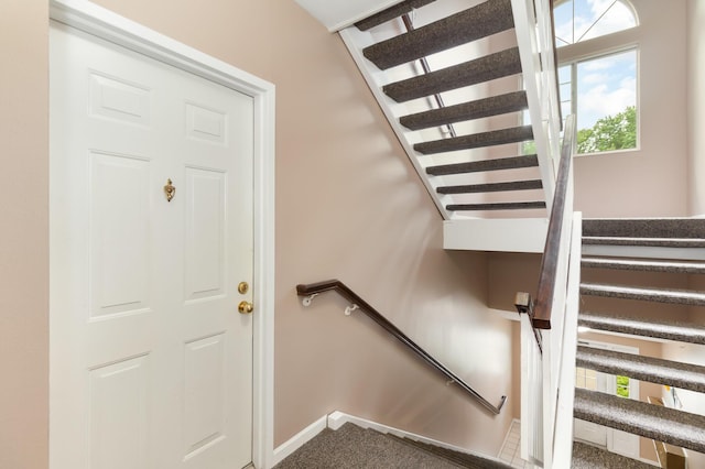 2308 Sawmill Ct Unit 207, Burlington, KY 41005 - stairway with baseboards and carpet flooring