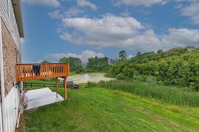10658 Blooming Ct, Independence, KY 41051 - view of green lawn with a deck with water view