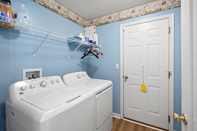 10335 Mackay Ct, Independence, KY 41051 - laundry area with washer and clothes dryer and dark wood finished floors