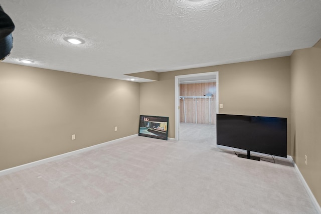 10335 Mackay Ct, Independence, KY 41051 - finished below grade area featuring carpet, a textured ceiling, baseboards, and recessed lighting