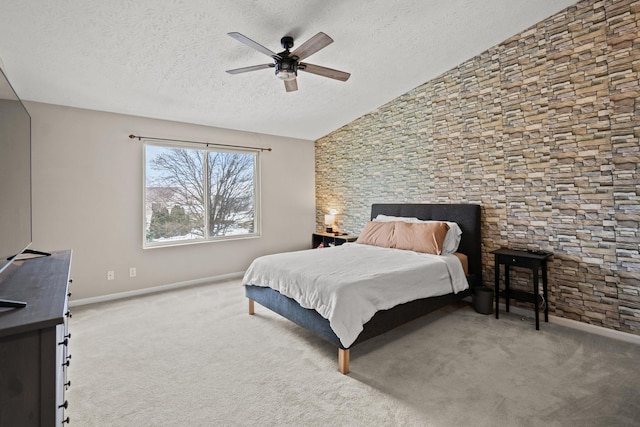 10335 Mackay Ct, Independence, KY 41051 - carpeted bedroom featuring a textured ceiling, vaulted ceiling, baseboards, and a ceiling fan