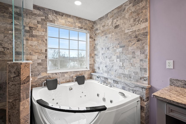 10335 Mackay Ct, Independence, KY 41051 - bathroom featuring a tub with jets and vanity