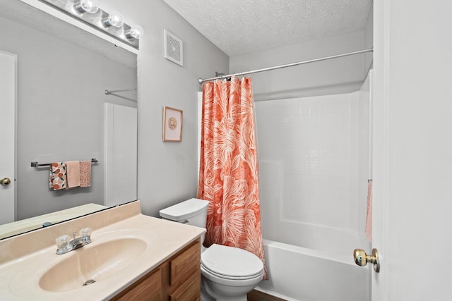 10335 Mackay Ct, Independence, KY 41051 - bathroom featuring toilet, vanity, shower / bath combo, and a textured ceiling