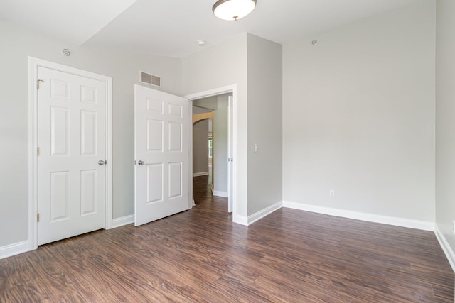 1285 Edinburgh Ln, Union, KY 41091 - unfurnished bedroom with dark wood-style floors and arched walkways