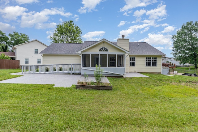 1285 Edinburgh Ln, Union, KY 41091 - back of house with a patio area, a sunroom, a chimney, and a shingled roof