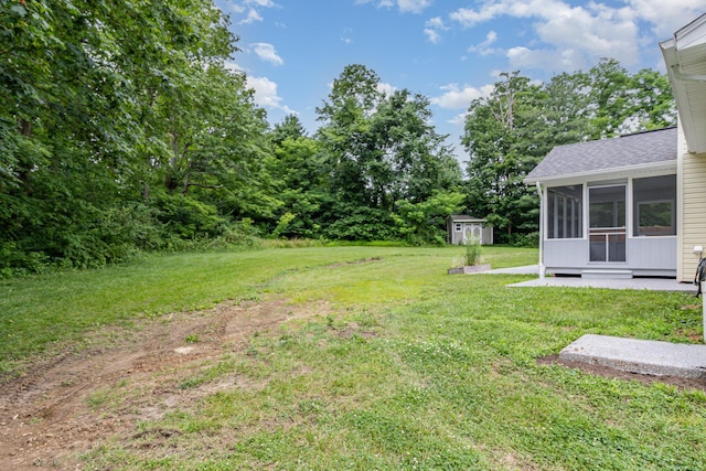 1285 Edinburgh Ln, Union, KY 41091 - view of green lawn with a sunroom and a shed
