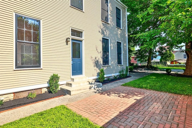 410 Emma St, Covington, KY 41011 - view of exterior entry with a lawn
