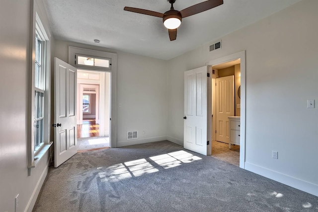 410 Emma St, Covington, KY 41011 - unfurnished bedroom with carpet flooring and ceiling fan