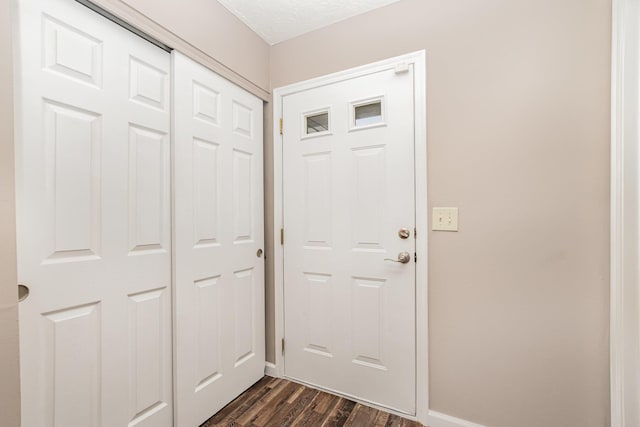 2139 Algiers St, Union, KY 41091 - entryway featuring dark wood-type flooring and baseboards
