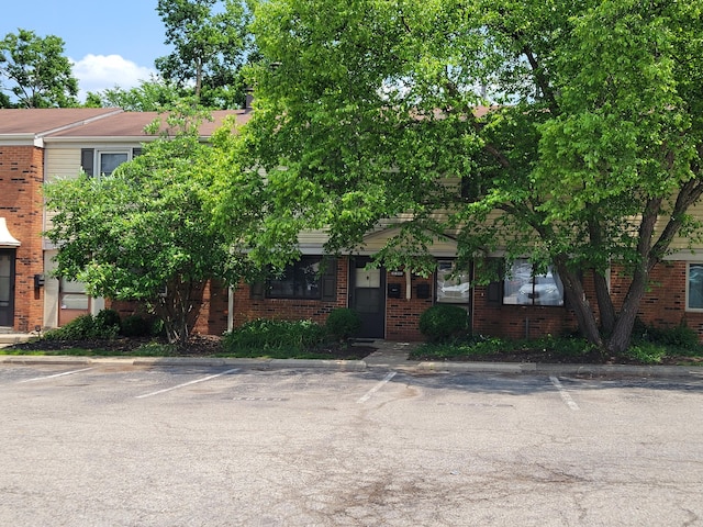 6859 Curtis Way, Florence, KY 41042 - obstructed view of property featuring brick siding and uncovered parking