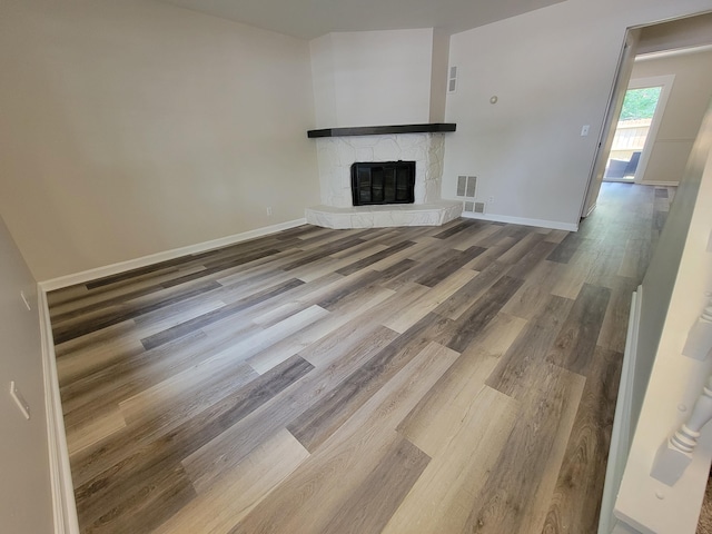 6859 Curtis Way, Florence, KY 41042 - unfurnished living room featuring wood finished floors and a fireplace