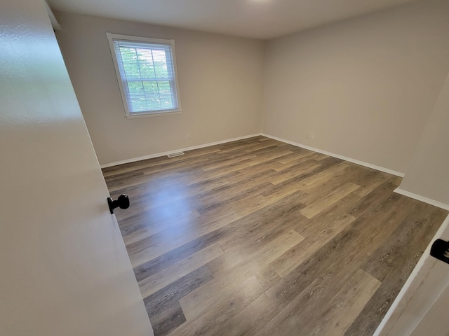 6859 Curtis Way, Florence, KY 41042 - spare room featuring dark wood-style floors and baseboards