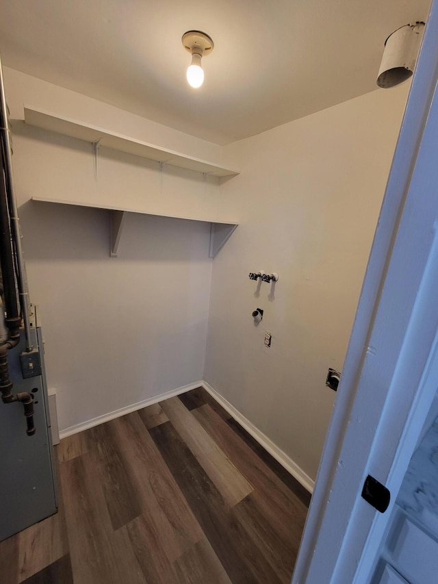 6859 Curtis Way, Florence, KY 41042 - laundry area with dark wood-type flooring and baseboards