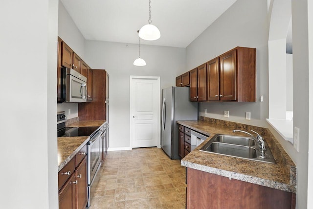 2225 Rolling Hills Dr, Covington, KY 41017 - kitchen with appliances with stainless steel finishes, decorative light fixtures, and stone finish floors