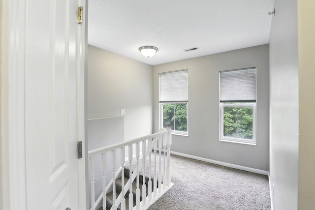 2225 Rolling Hills Dr, Covington, KY 41017 - hallway with an upstairs landing and carpet flooring