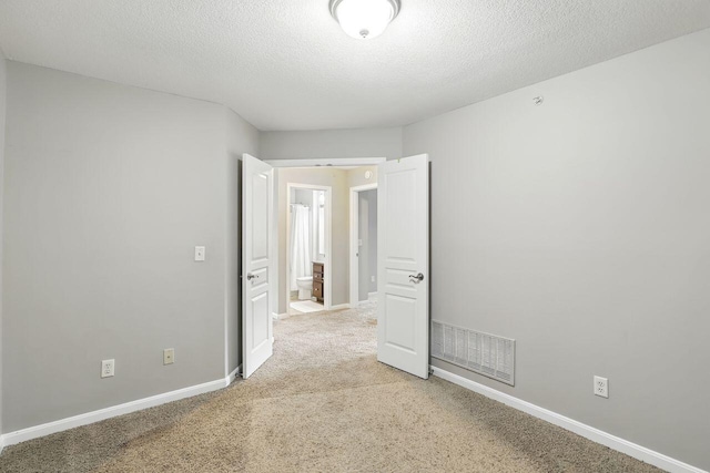 2225 Rolling Hills Dr, Covington, KY 41017 - spare room with light colored carpet and a textured ceiling