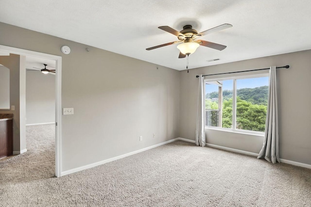 2225 Rolling Hills Dr, Covington, KY 41017 - empty room with ceiling fan, carpet floors, and a smoke detector