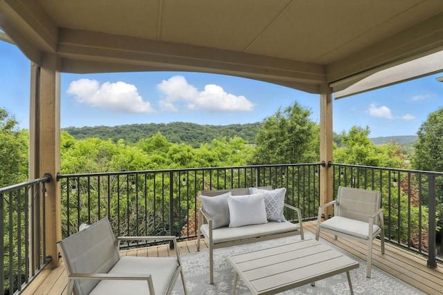 2225 Rolling Hills Dr, Covington, KY 41017 - balcony with an outdoor hangout area and a forest view