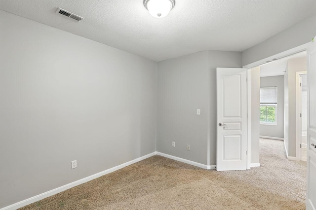 2225 Rolling Hills Dr, Covington, KY 41017 - unfurnished room with carpet floors and a textured ceiling