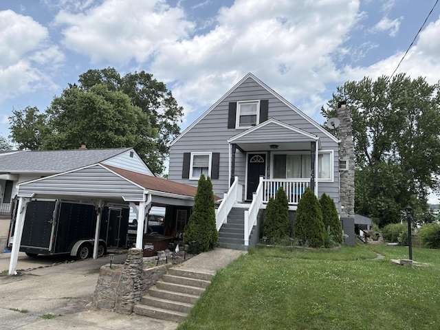 107 W 1st St, Silver Grove, KY 41085 - bungalow with a front lawn, driveway, a chimney, and a porch