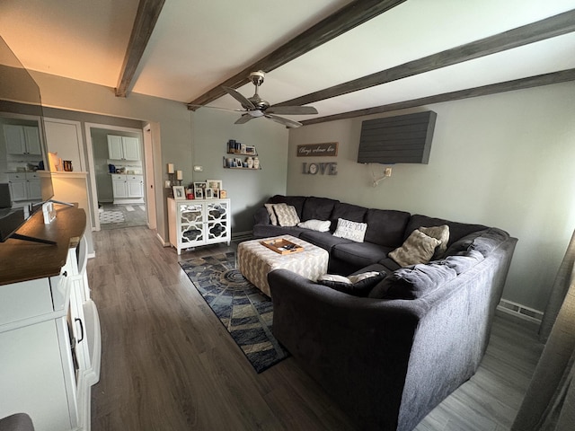 107 W 1st St, Silver Grove, KY 41085 - living room with ceiling fan, dark wood-style floors, and beamed ceiling