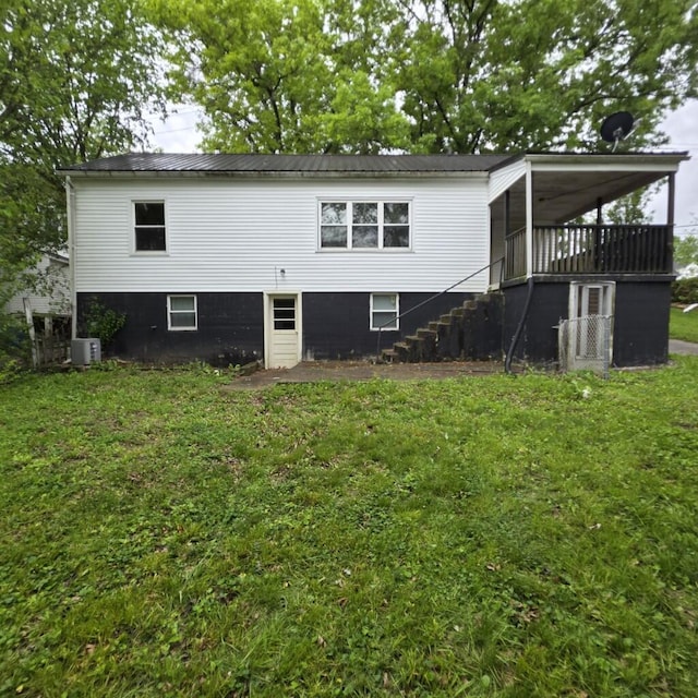 106 Roland Ave, Owenton, KY 40359 - back of house featuring stairs, a yard, metal roof, and central air condition unit
