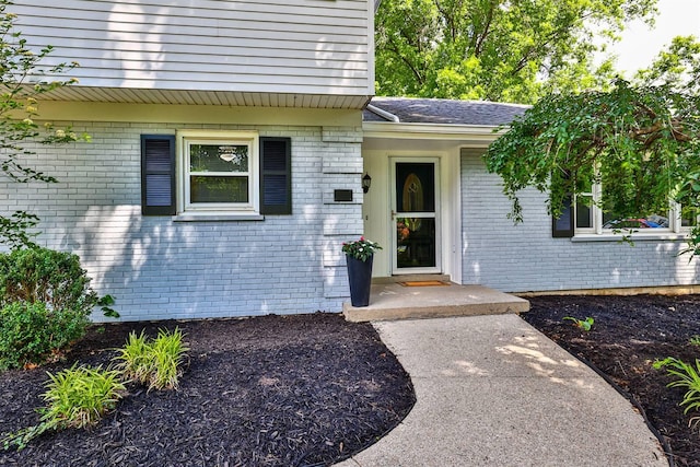 724 Dudley Rd, Edgewood, KY 41017 - doorway to property with brick siding and a shingled roof