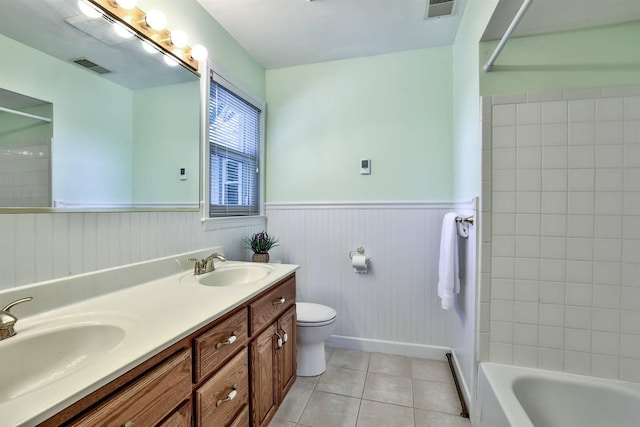 724 Dudley Rd, Edgewood, KY 41017 - full bathroom with tile patterned flooring, double vanity, a wainscoted wall, and bathtub / shower combination