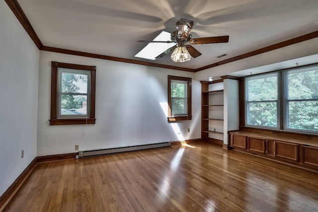 724 Dudley Rd, Edgewood, KY 41017 - empty room with a baseboard radiator, healthy amount of natural light, a ceiling fan, ornamental molding, and wood finished floors