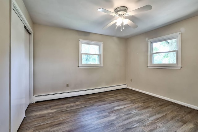 724 Dudley Rd, Edgewood, KY 41017 - unfurnished bedroom featuring a baseboard heating unit, wood finished floors, a closet, and a ceiling fan