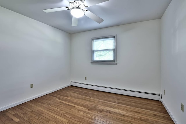 724 Dudley Rd, Edgewood, KY 41017 - empty room with a baseboard heating unit, wood finished floors, and ceiling fan