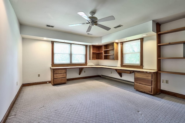 724 Dudley Rd, Edgewood, KY 41017 - unfurnished office with built in desk, baseboard heating, healthy amount of natural light, and a ceiling fan