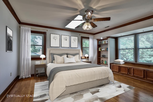 724 Dudley Rd, Edgewood, KY 41017 - bedroom featuring multiple windows, crown molding, dark wood-type flooring, and a ceiling fan