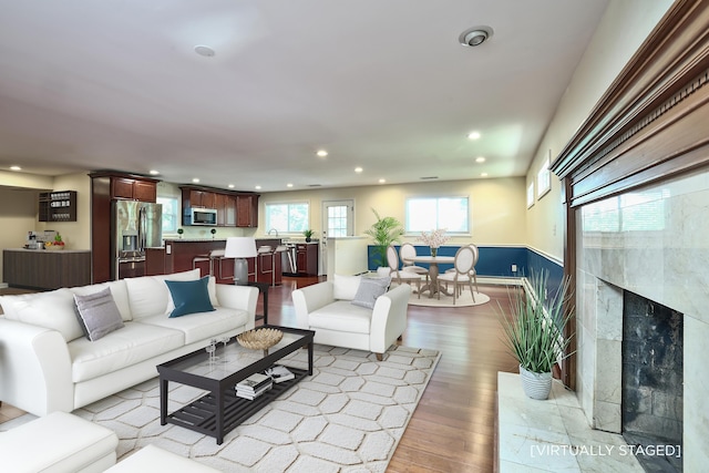 724 Dudley Rd, Edgewood, KY 41017 - living room with wood finished floors, recessed lighting, and a high end fireplace