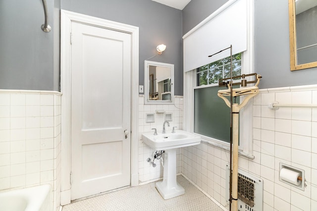 34 Ridge Rd, Fort Mitchell, KY 41011 - full bathroom with tile walls, tile patterned flooring, a wainscoted wall, and heating unit