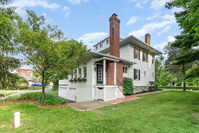 34 Ridge Rd, Fort Mitchell, KY 41011 - view of side of home featuring a yard and a chimney