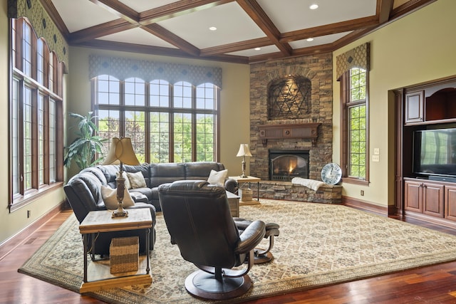 944 Squire Oaks Dr, Villa Hills, KY 41017 - living area featuring plenty of natural light, coffered ceiling, beam ceiling, a stone fireplace, and wood finished floors