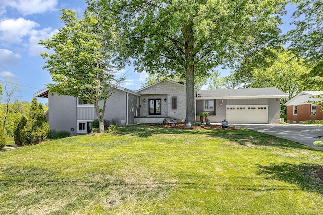 2003 Pieck Dr, Fort Wright, KY 41011 - view of front of property with an attached garage, concrete driveway, and a front yard