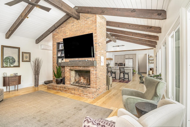 2003 Pieck Dr, Fort Wright, KY 41011 - living area featuring light wood-style flooring, a fireplace, wood ceiling, a wall unit AC, and a ceiling fan