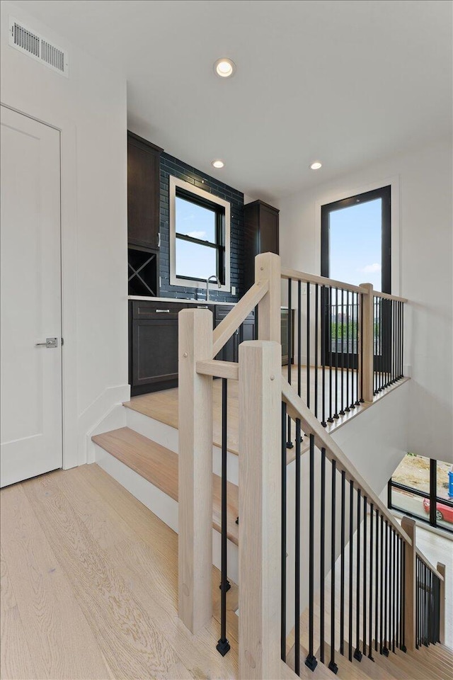76 W 13th St Unit 34, Newport, KY 41071 - stairs featuring recessed lighting and wood finished floors