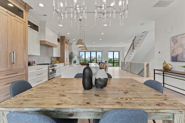 76 W 13th St Unit 34, Newport, KY 41071 - dining space with a chandelier and recessed lighting